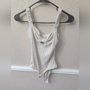 Listicle cream colored Body Suit